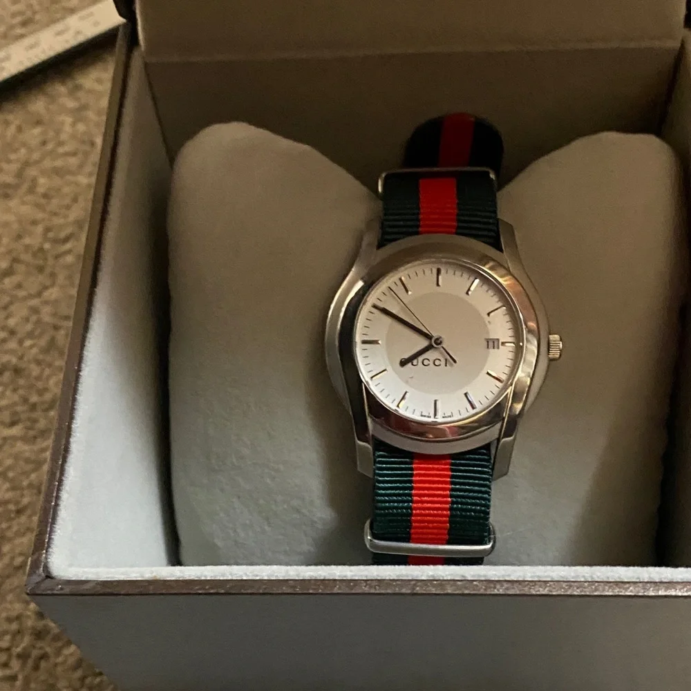 Gucci Silver Timepiece with Multicolor Strap